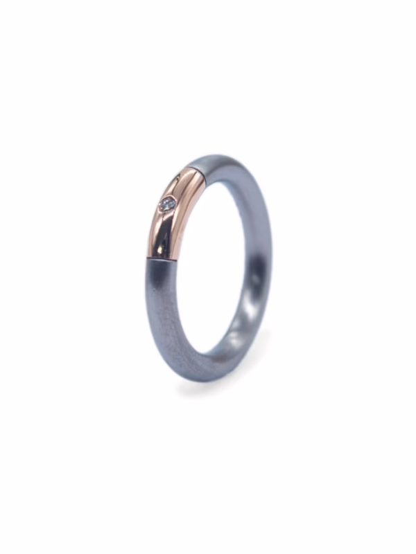Ring- Titanium with a touch of Rose gold and Diamond
