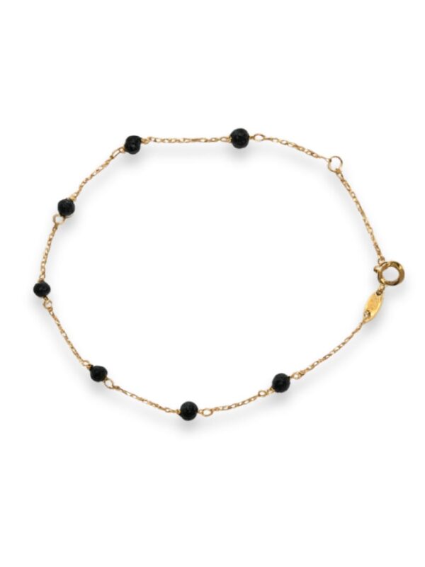 Onyx W: 0.80g Gold F:750